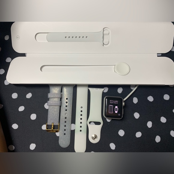 Silver Apple Watch Series 3 38mm with white sports band, extra arm band - Picture 2 of 14